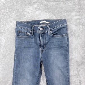 Levi's Slimming Skinny Jeans Women 26 Blue Raw Hem Medium Wash Stretch